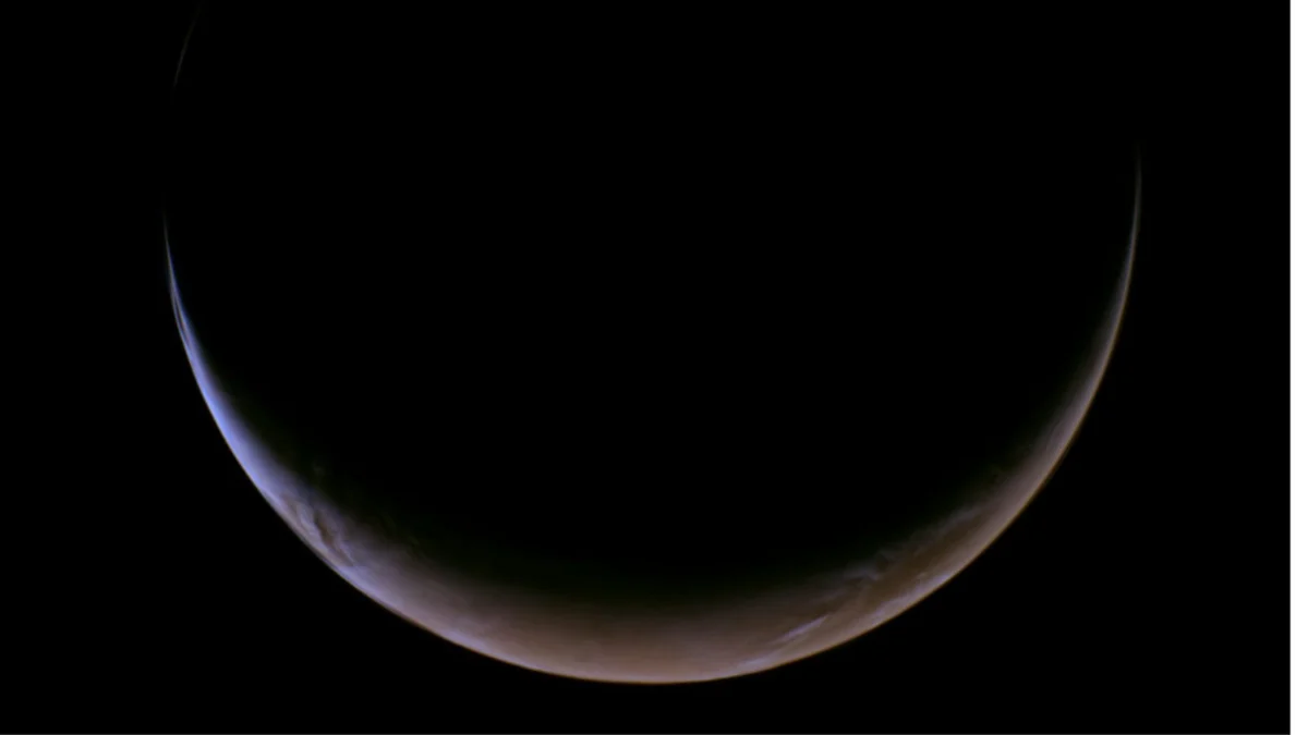 Celestial Slingshot: NASA’s Psyche Spacecraft Captures Rare Crescent Mars During Critical Gravity Assist