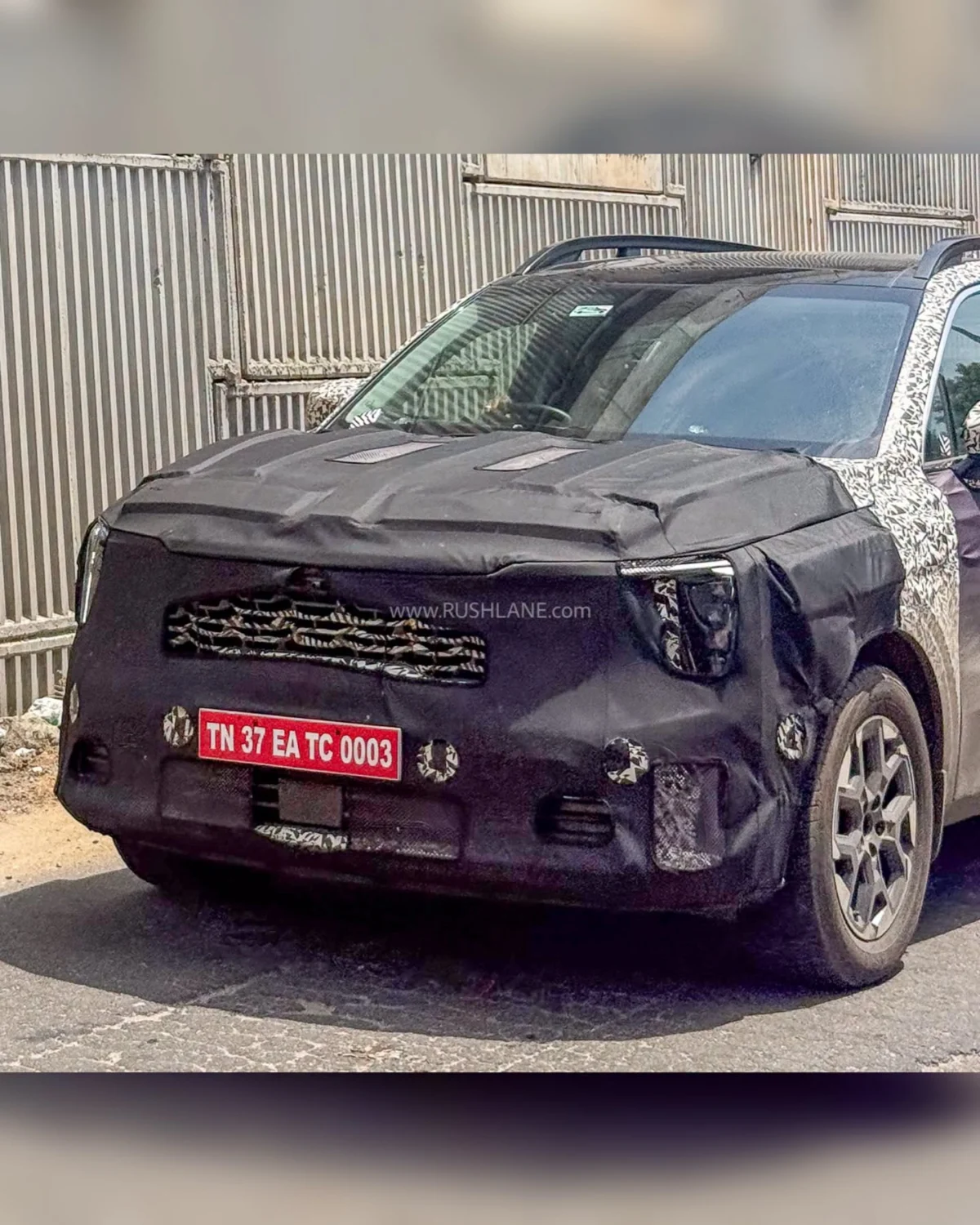 Kia India Signals Dual-Path Electrification: Sorento Hybrid and Syros EV Teased Amid Record Sales